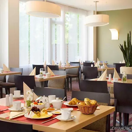 Отель Mercure Airport Tegel 4*
