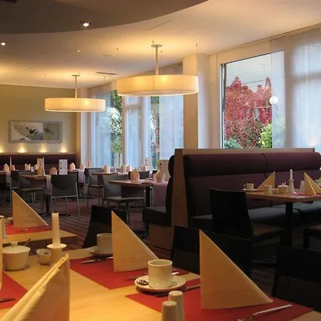 Отель Mercure Airport Tegel 4*